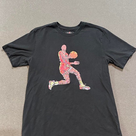 Other - Jordan black t-shirt with graphic of air Jordan in a dunking pose, size M